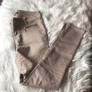 Blush toned jeans with rose gold zippers
